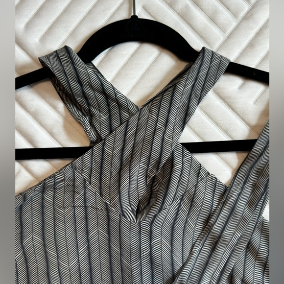 Elegant blouse features a unique design in navy blue tones. - Picture 3 of 4